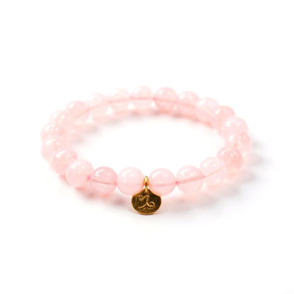 Pulsera de Cuarzo Rosa con dije del signo Zodiacal, bañado en Oro 18K