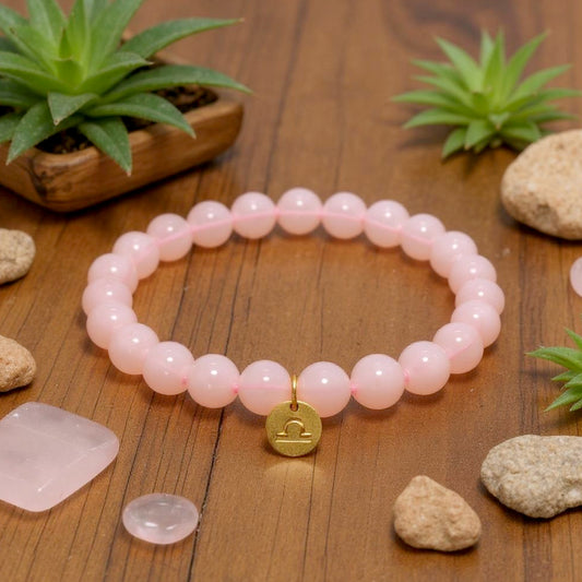 Pulsera de Cuarzo Rosa con dije del signo Zodiacal, bañado en Oro 18K