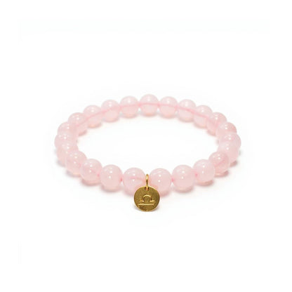 Pulsera de Cuarzo Rosa con dije del signo Zodiacal, bañado en Oro 18K